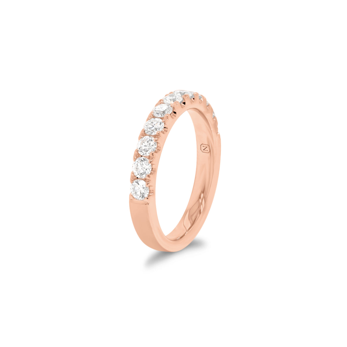 11-Diamond Wedding Band  - 18K gold weighing 4.17 grams  - 11 round diamonds totaling 0.83 carats