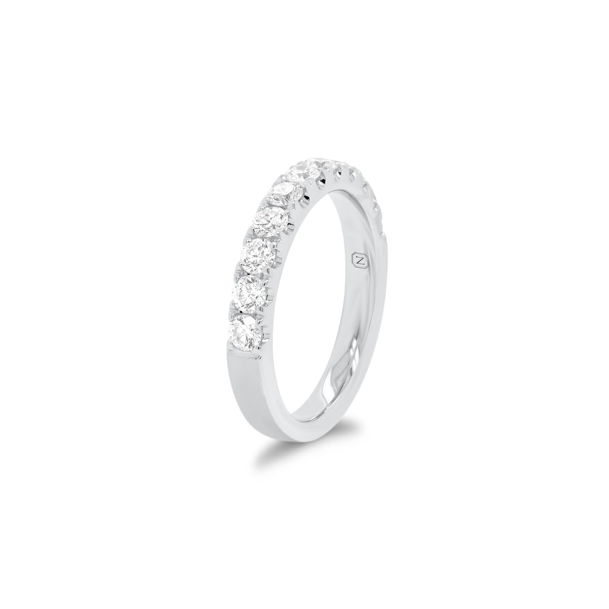 11-Diamond Wedding Band  - 18K gold weighing 4.17 grams  - 11 round diamonds totaling 0.83 carats