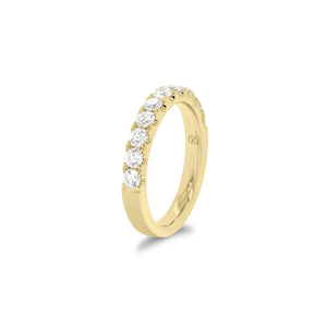 11-Diamond Wedding Band  - 18K gold weighing 4.17 grams  - 11 round diamonds totaling 0.83 carats