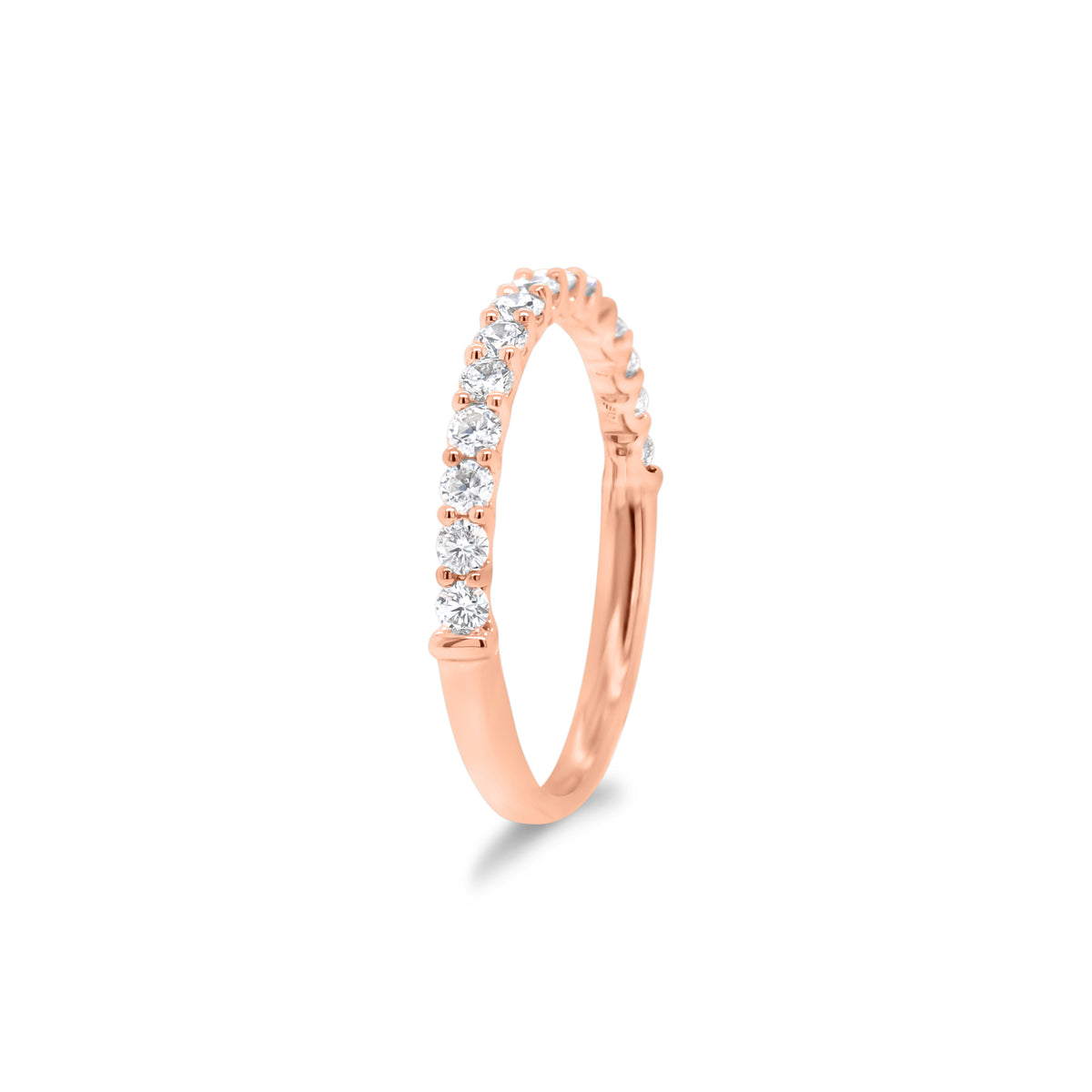 Simple Diamond Wedding Band  - 18K gold weighing 1.60 grams  - 15 round diamonds totaling 0.43 carats