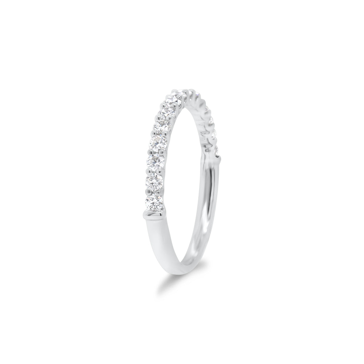 Simple Diamond Wedding Band  - 18K gold weighing 1.60 grams  - 15 round diamonds totaling 0.43 carats