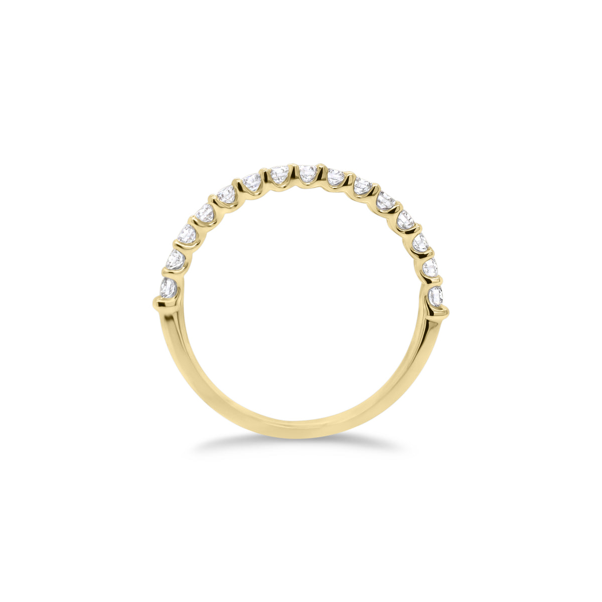 Simple Diamond Wedding Band  - 18K gold weighing 1.60 grams  - 15 round diamonds totaling 0.43 carats