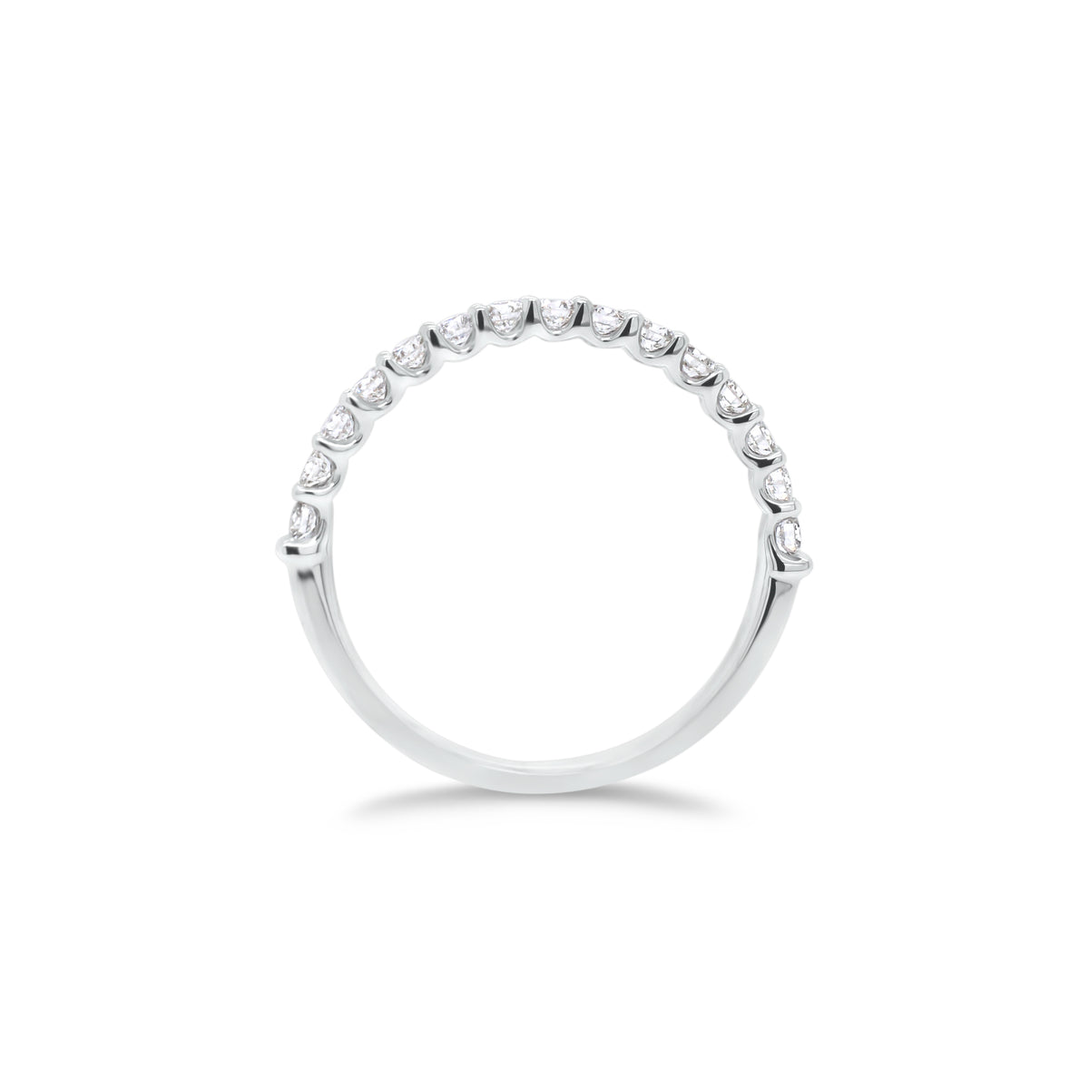 Simple Diamond Wedding Band  - 18K gold weighing 1.60 grams  - 15 round diamonds totaling 0.43 carats