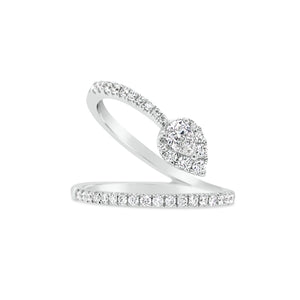 Diamond Wave Ring with Diamond Pear   -0.19 ct pear-shaped diamond.  - 0.38 ct (total weight of round-cut diamonds)
