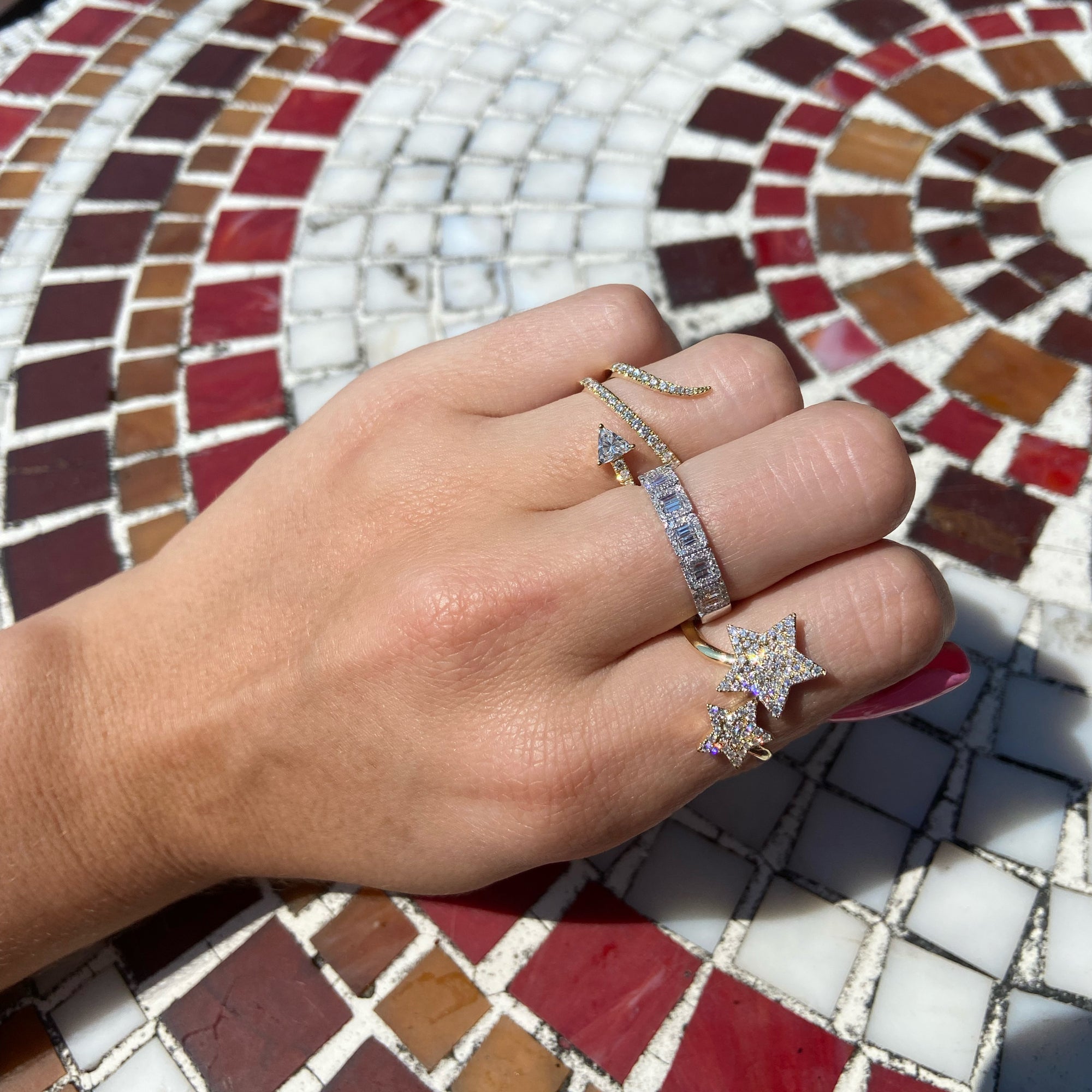 Trillion-Cut Diamond Wrap Ring  - 18K gold weighing 4.45 grams  - 37 round diamonds totaling 0.32 carats  - 0.22 ct trillion-cut diamond