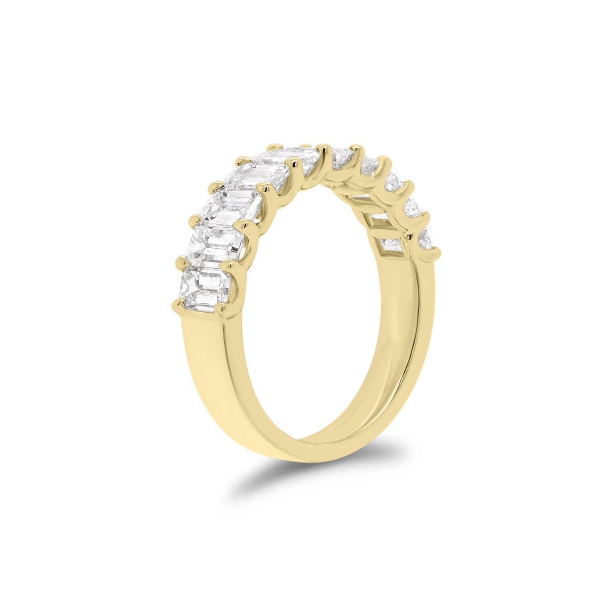 Emerald-Cut Diamond Wedding Band  - 18K gold weighing 4.09 grams  - 10 emerald-cut diamonds totaling 2.45 carats (GIA-graded F-G color, VS clarity)