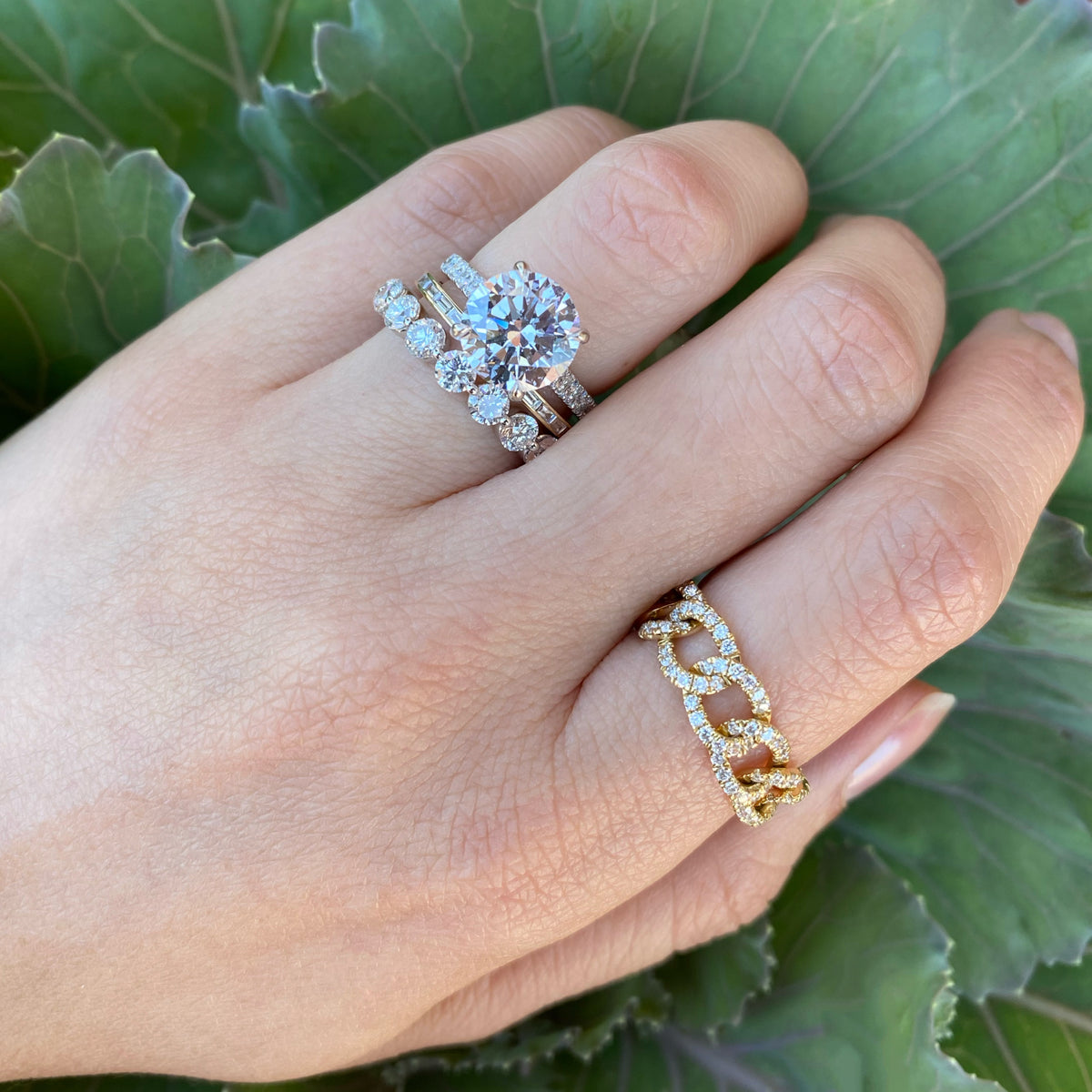 Female Model Wearing 2.62 ct Diamond Eternity Ring - 18K gold weighing 2.48 grams  - 17 round diamonds weighing 2.62 carats