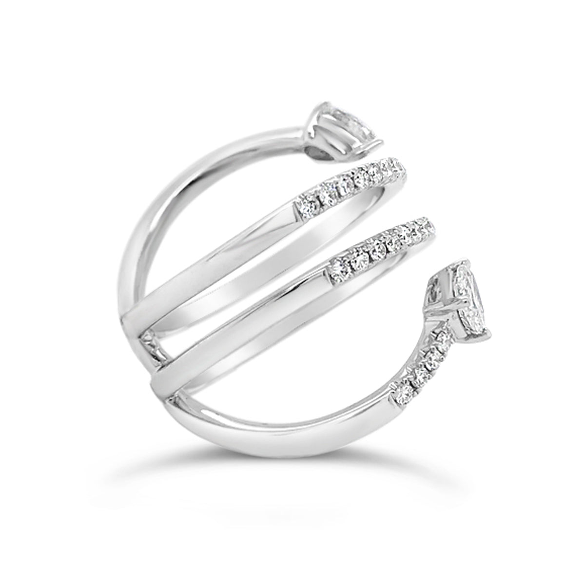 Pear-Shaped Diamond Crossover Fashion Ring  -18k white gold weighing 5.52 grams  -48 round diamonds weighing .42 carats  -2 pear-shaped diamonds weighing .52 carats