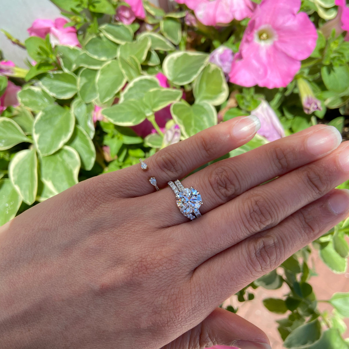 Female Model Wearing Diamond Curved Wedding Band  - 14K gold weighing 1.97 grams  - 17 round diamonds totaling 0.30 carats