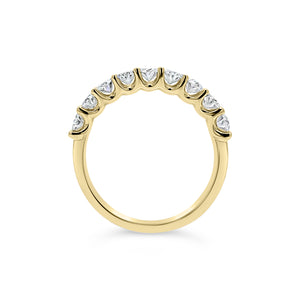 Diamond Ovals Wedding Band -18K yellow gold weighing 3.46 grams -9 oval-shaped diamonds totaling 1.31 carats