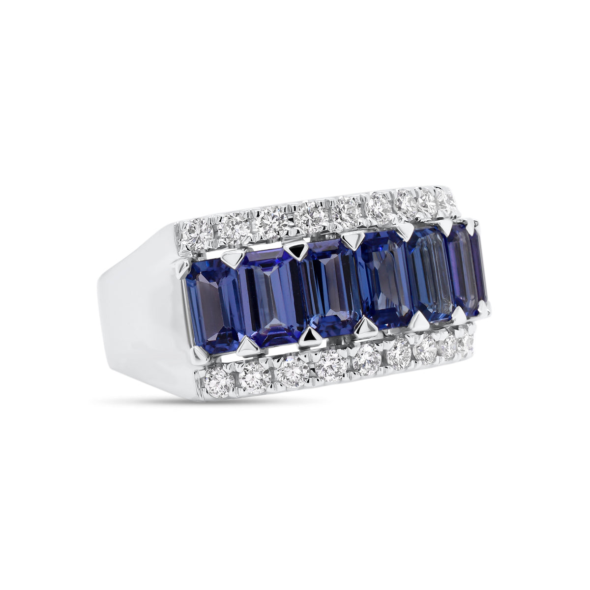 Tanzanite & diamond band - 18K gold weighing 6.06 grams  - 9 tanzanites totaling 2.55 carats  - 26 round diamonds totaling 0.52 carats