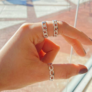 Female Model Wearing Diamond Geometric Stackable Ring  - 18K gold weighing 3.78 grams  - 24 round diamonds totaling 0.21 carats