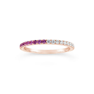 Gradient Diamond and Pink Sapphire Eternity Ring  -14K gold weighing 1.42 grams  -20 round diamonds totaling 0.26 carats  -21 pink sapphires totaling 0.38 carats