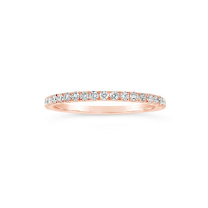 Gradient Diamond and Pink Sapphire Eternity Ring  -14K gold weighing 1.42 grams  -20 round diamonds totaling 0.26 carats  -21 pink sapphires totaling 0.38 carats