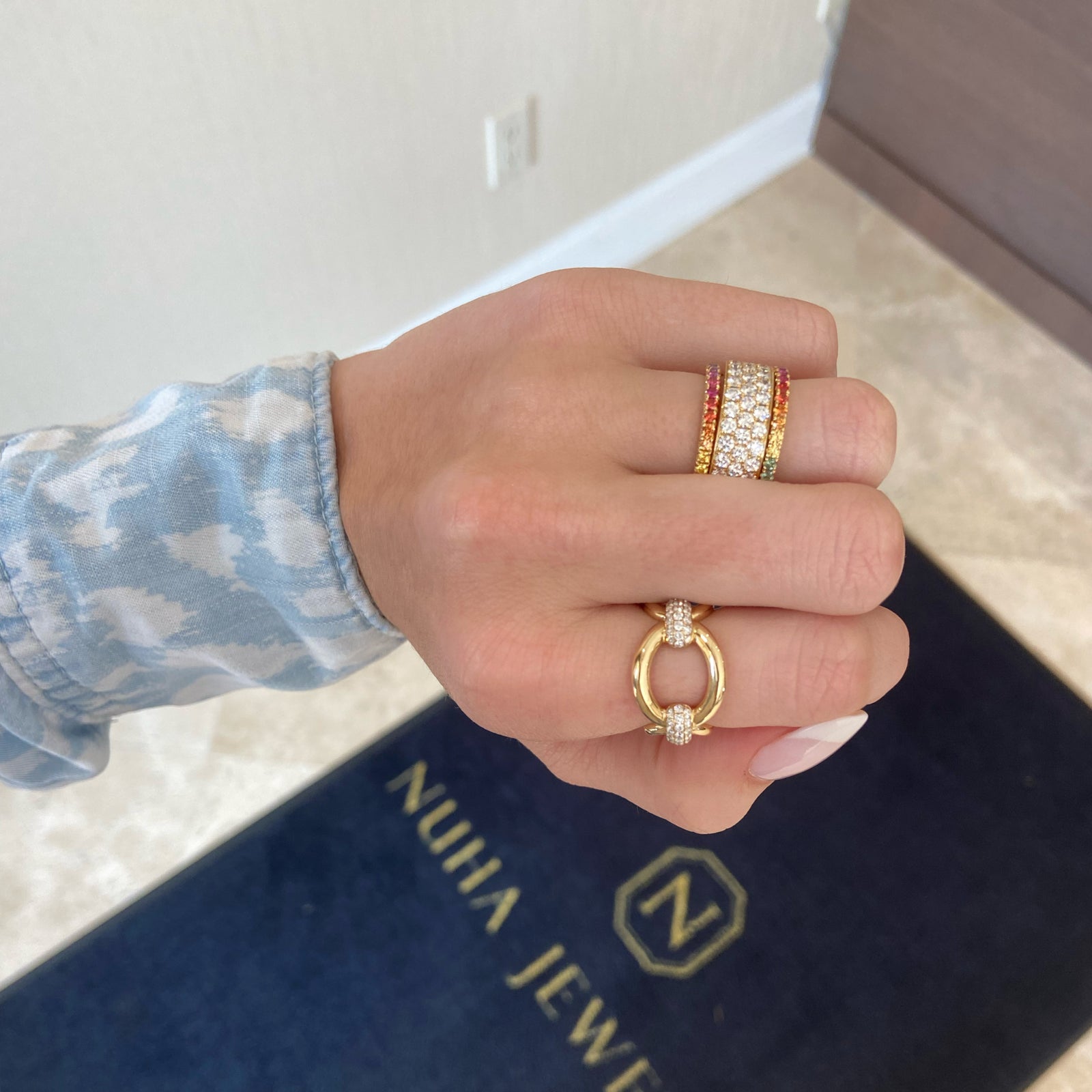 Diamond Triple Row Band  - 18K gold weighing 6.11 grams  - 46 round diamonds totaling 1.88 carats