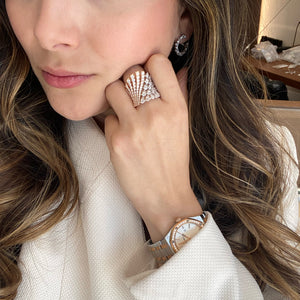 Female Model Wearing Pear-Shaped Diamond Statement Ring - 18K gold weighing 12.32 grams  - 133 round diamonds weighing 2.01 carats  - 22 pear-shaped diamonds weighing 1.28 carats