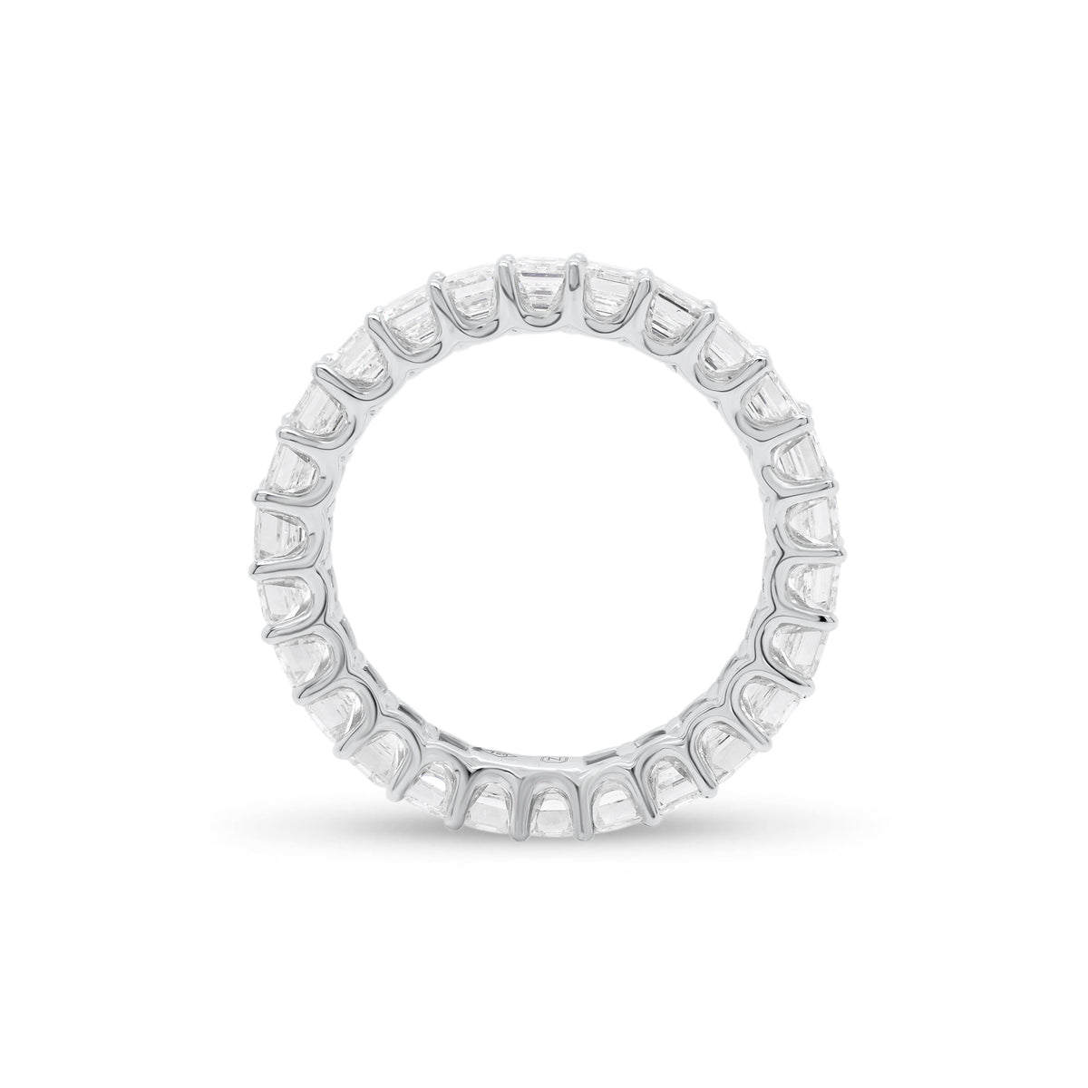 Emerald-Cut Diamond Eternity Band  - 18K gold weighing 2.38 grams  - 26 emerald-cut diamonds totaling 3.72 carats (GIA-graded G color, VS2 clarity)