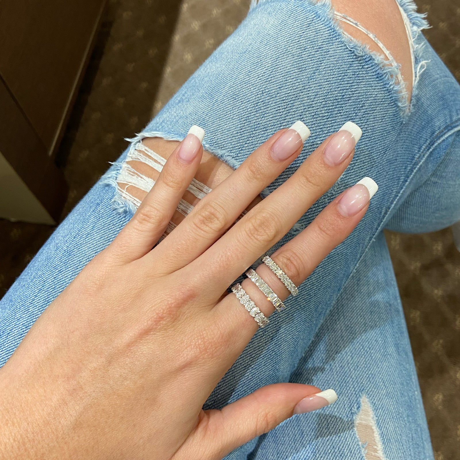 Oval Diamond Eternity Band  - 18K gold weighing 3.11 grams  - 21 oval brilliant-cut diamonds totaling 3.15 carats (GIA-graded G color, VS clarity)