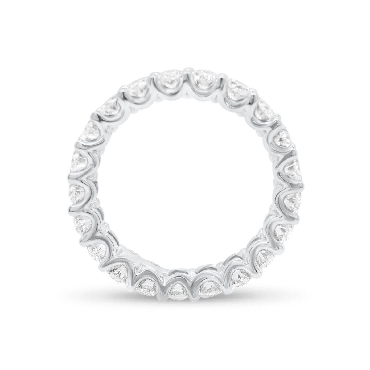 Oval Diamond Eternity Band  - 18K gold weighing 3.11 grams  - 21 oval brilliant-cut diamonds totaling 3.15 carats (GIA-graded G color, VS clarity)