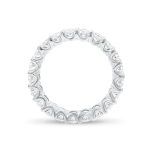 Oval Diamond Eternity Band  - 18K gold weighing 3.11 grams  - 21 oval brilliant-cut diamonds totaling 3.15 carats (GIA-graded G color, VS clarity)