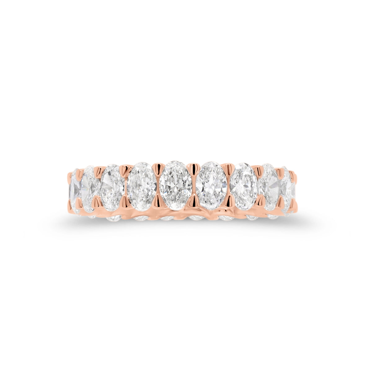 Oval Diamond Eternity Band  - 18K gold weighing 3.11 grams  - 21 oval brilliant-cut diamonds totaling 3.15 carats (GIA-graded G color, VS clarity)