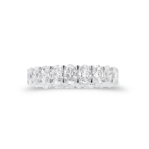 Oval Diamond Eternity Band  - 18K gold weighing 3.11 grams  - 21 oval brilliant-cut diamonds totaling 3.15 carats (GIA-graded G color, VS clarity)