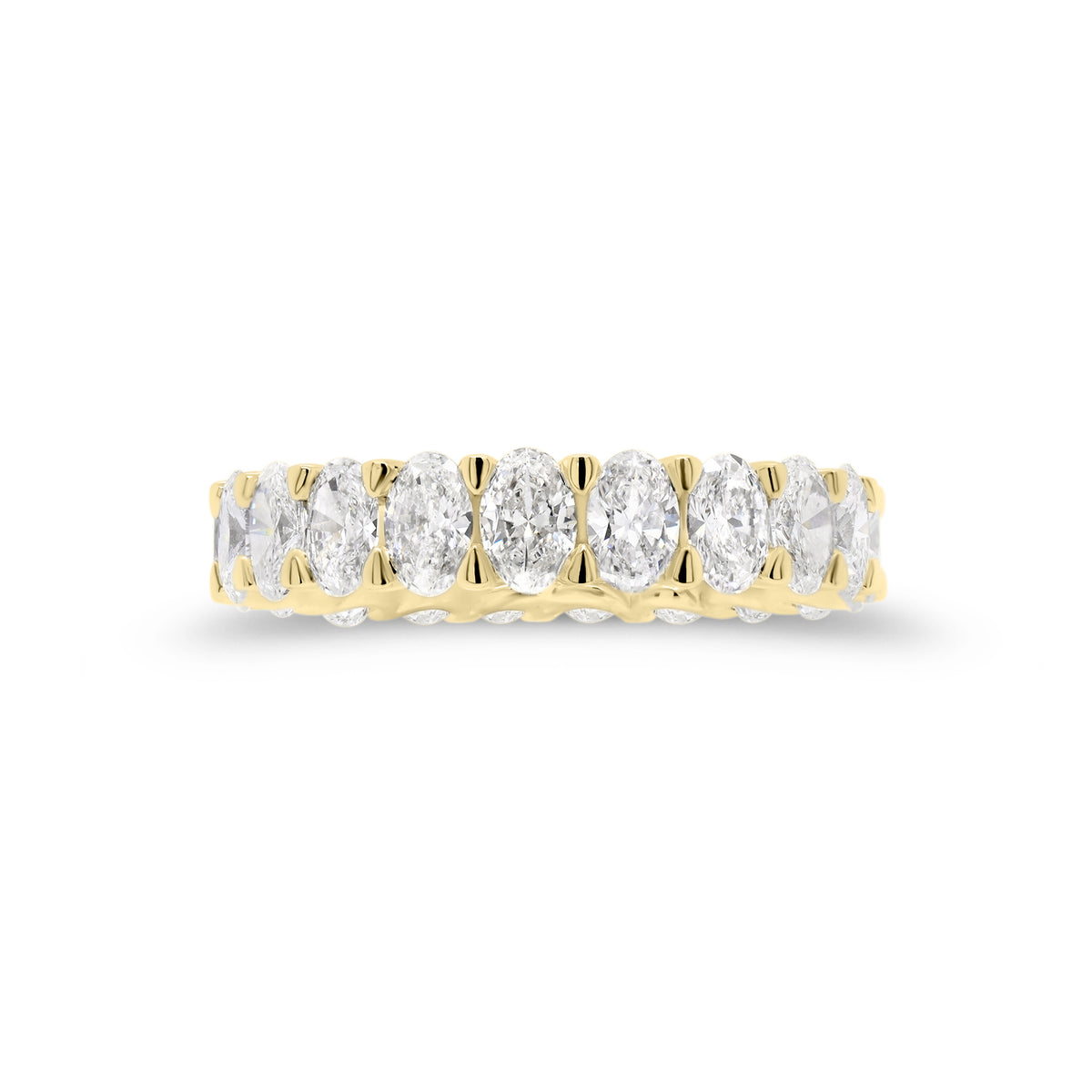 Oval Diamond Eternity Band  - 18K gold weighing 3.11 grams  - 21 oval brilliant-cut diamonds totaling 3.15 carats (GIA-graded G color, VS clarity)