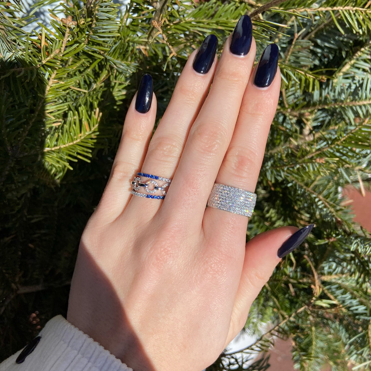 Female Model Wearing Diamond Circle Link Stackable Ring  - 18K gold weighing 3.23 grams  - 40 round diamonds totaling 0.20 carats