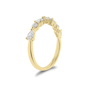Pear and Round Diamond Wedding Band - 18K gold weighing 1.96 grams  - 4 pear-shaped diamonds weighing 0.40 carats  - 3 round diamonds weighing 0.17 carats