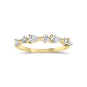 Pear and Round Diamond Wedding Band - 18K gold weighing 1.96 grams  - 4 pear-shaped diamonds weighing 0.40 carats  - 3 round diamonds weighing 0.17 carats
