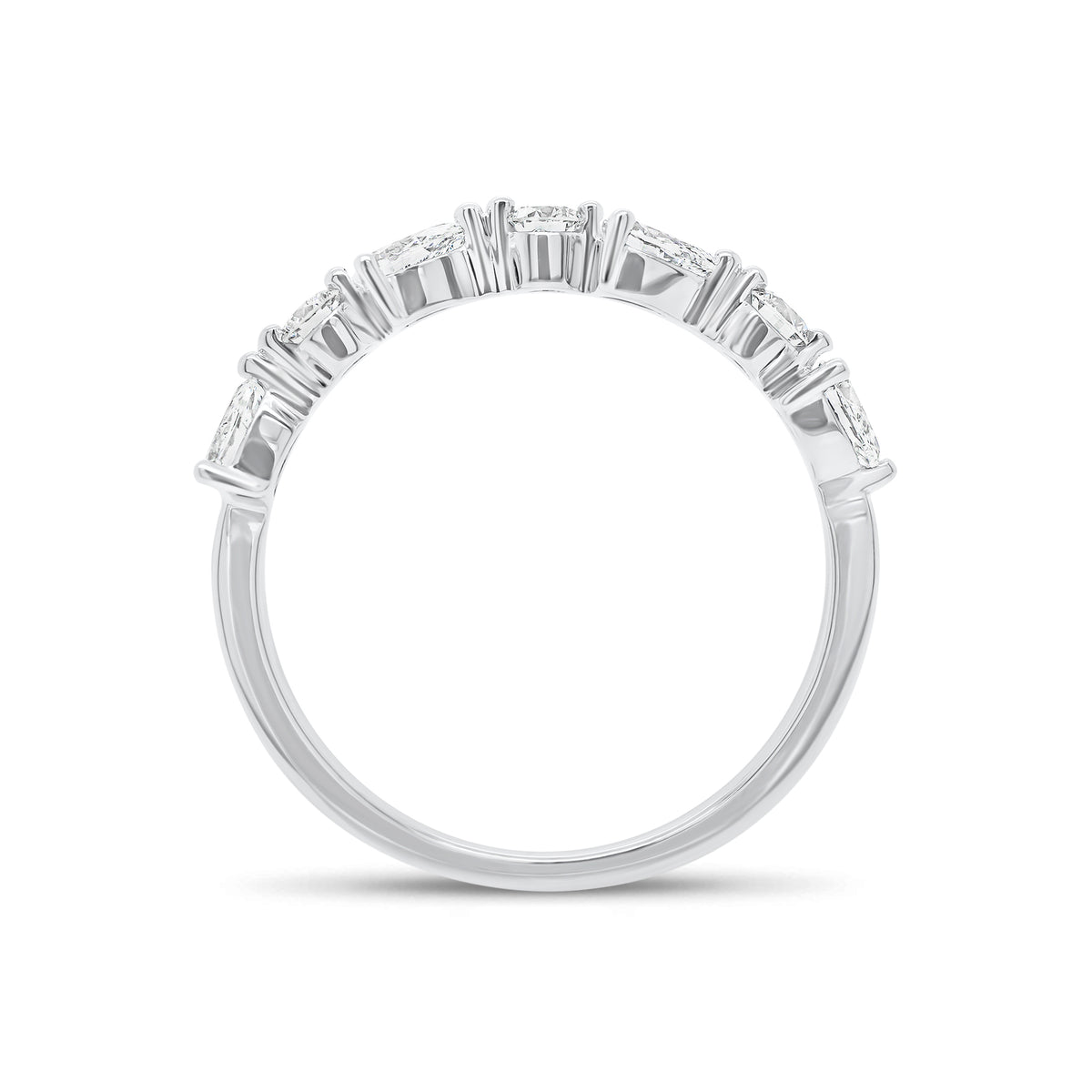 Pear and Round Diamond Wedding Band - 18K gold weighing 1.96 grams  - 4 pear-shaped diamonds weighing 0.40 carats  - 3 round diamonds weighing 0.17 carats