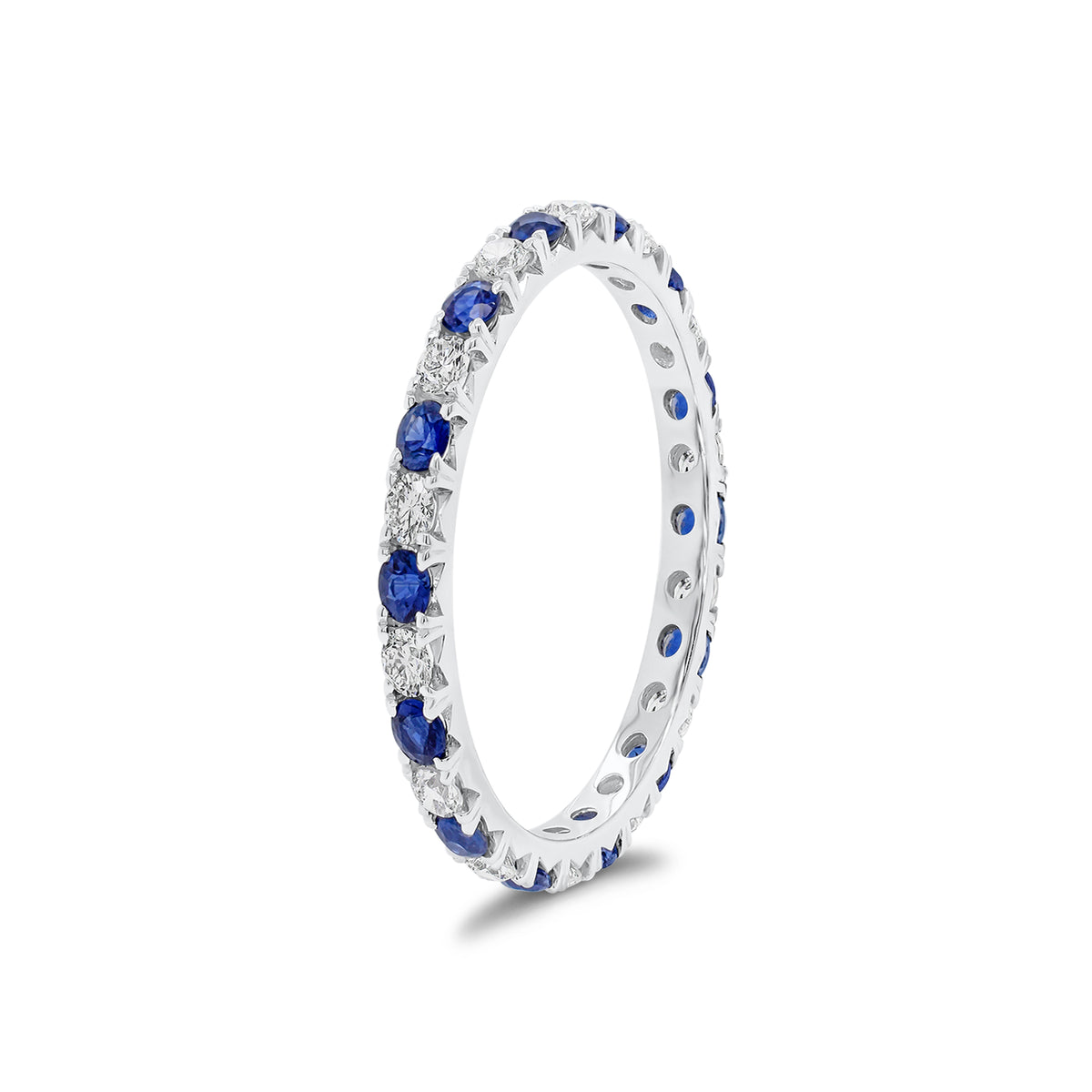 Sapphire and Diamond Eternity Ring - 18K gold weighing 1.52 grams  - 14 sapphires weighing 0.70 carats  - 14 round diamonds weighing 0.47 carats