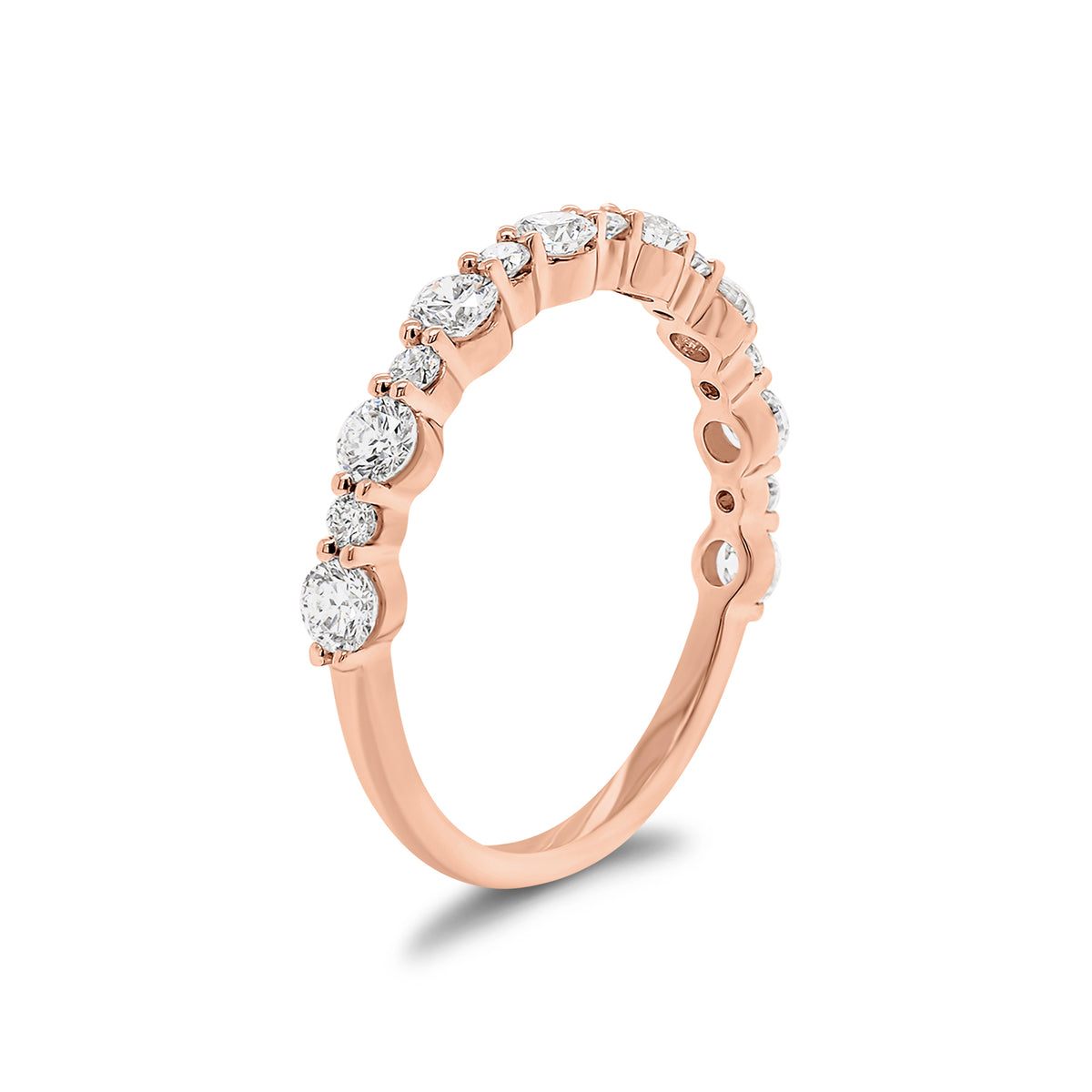 Diamond Pattern Wedding Band - 14K gold weighing 1.44 grams  - 8 round diamonds weighing 0.56 carats  - 7 round diamonds weighing 0.13 carats