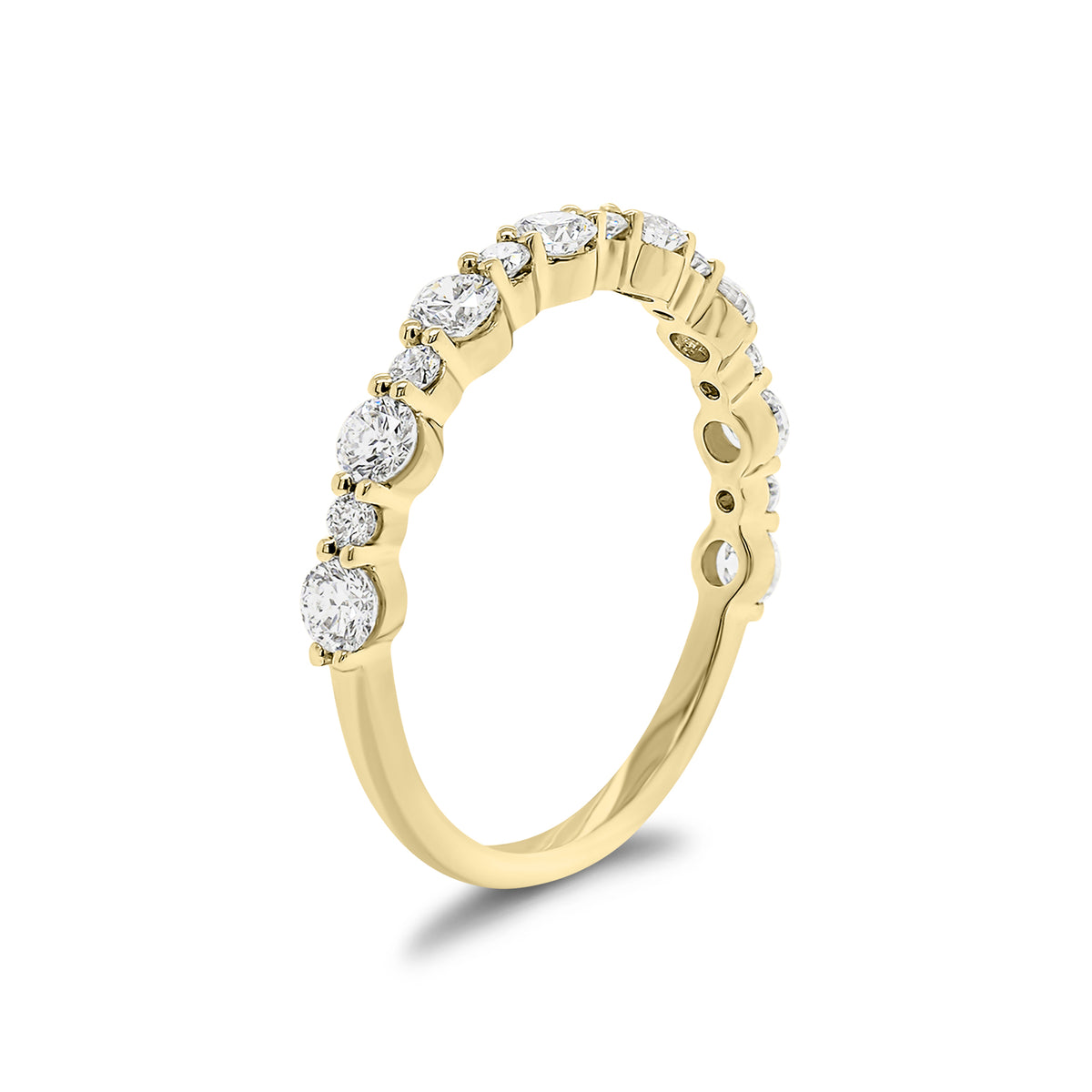 Diamond Pattern Wedding Band - 14K gold weighing 1.44 grams  - 8 round diamonds weighing 0.56 carats  - 7 round diamonds weighing 0.13 carats