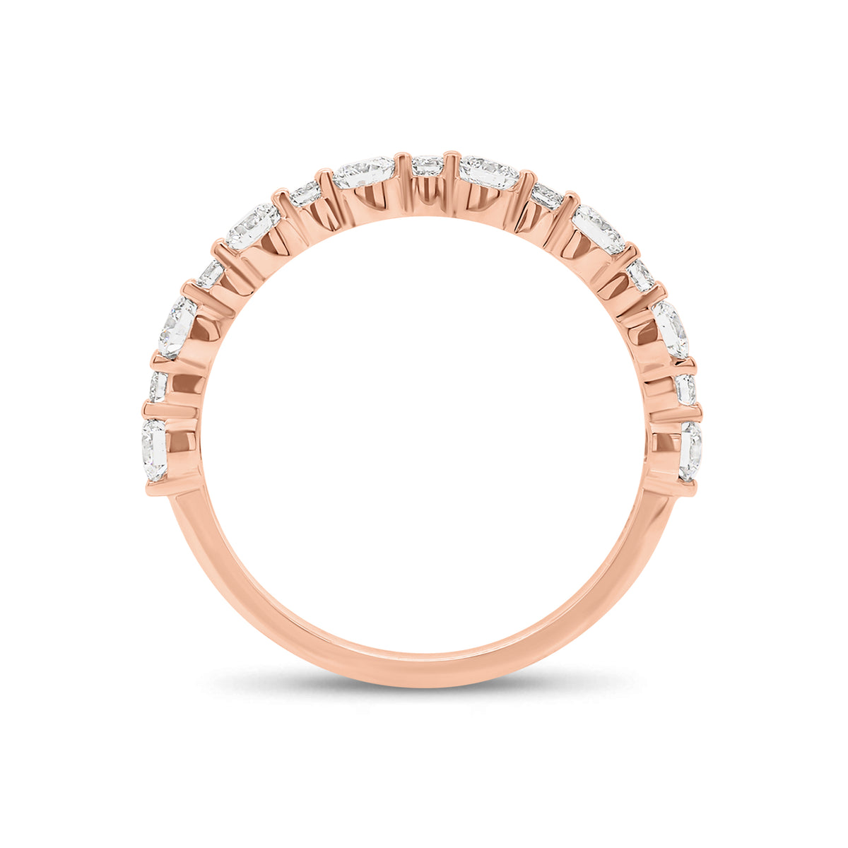 Diamond Pattern Wedding Band - 14K gold weighing 1.44 grams  - 8 round diamonds weighing 0.56 carats  - 7 round diamonds weighing 0.13 carats