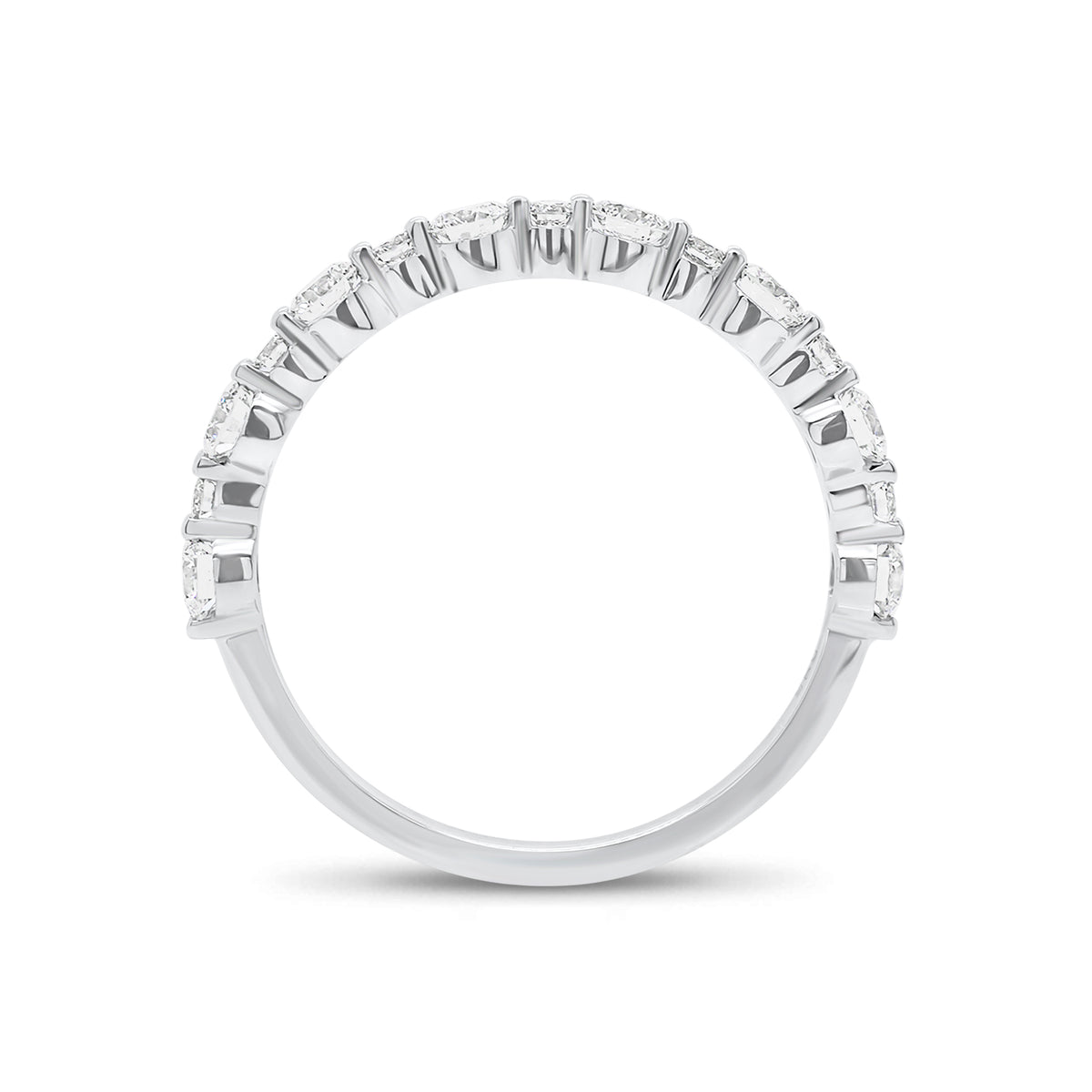 Diamond Pattern Wedding Band - 14K gold weighing 1.44 grams  - 8 round diamonds weighing 0.56 carats  - 7 round diamonds weighing 0.13 carats