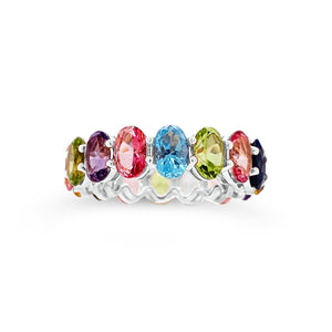 Multicolor gemstone eternity ring  -14K gold weighing 3.52 grams  -16 multicolor topaz gemstones weighing 7.47 carats