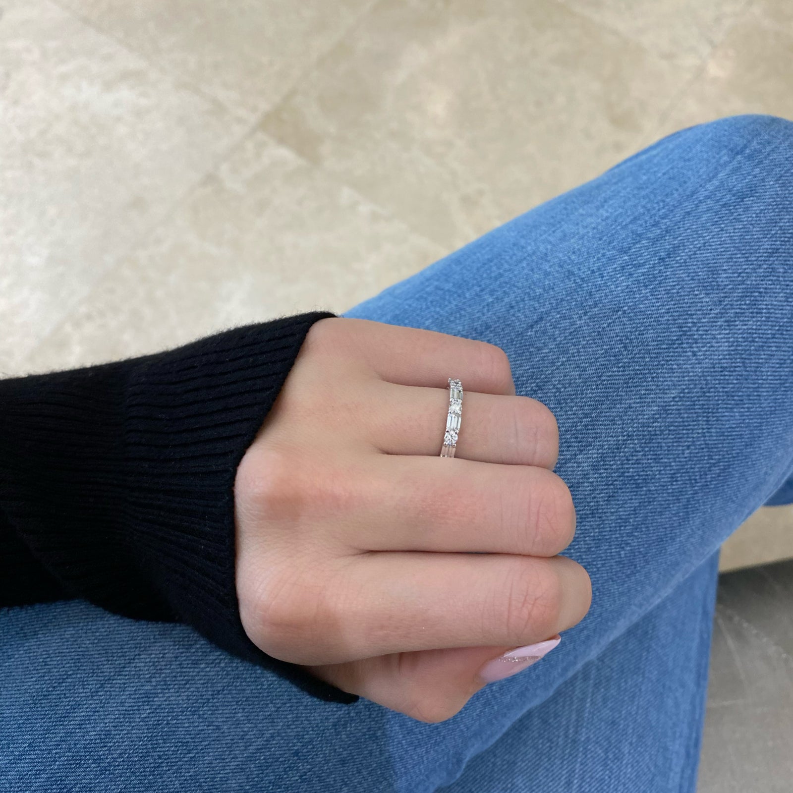 Round & Emerald-Cut Diamond Wedding Band - 18K white gold weighing 2.56 grams - 3 emerald-cut diamonds weighing 0.60 carats - 4 round diamonds weighing 0.52 carats