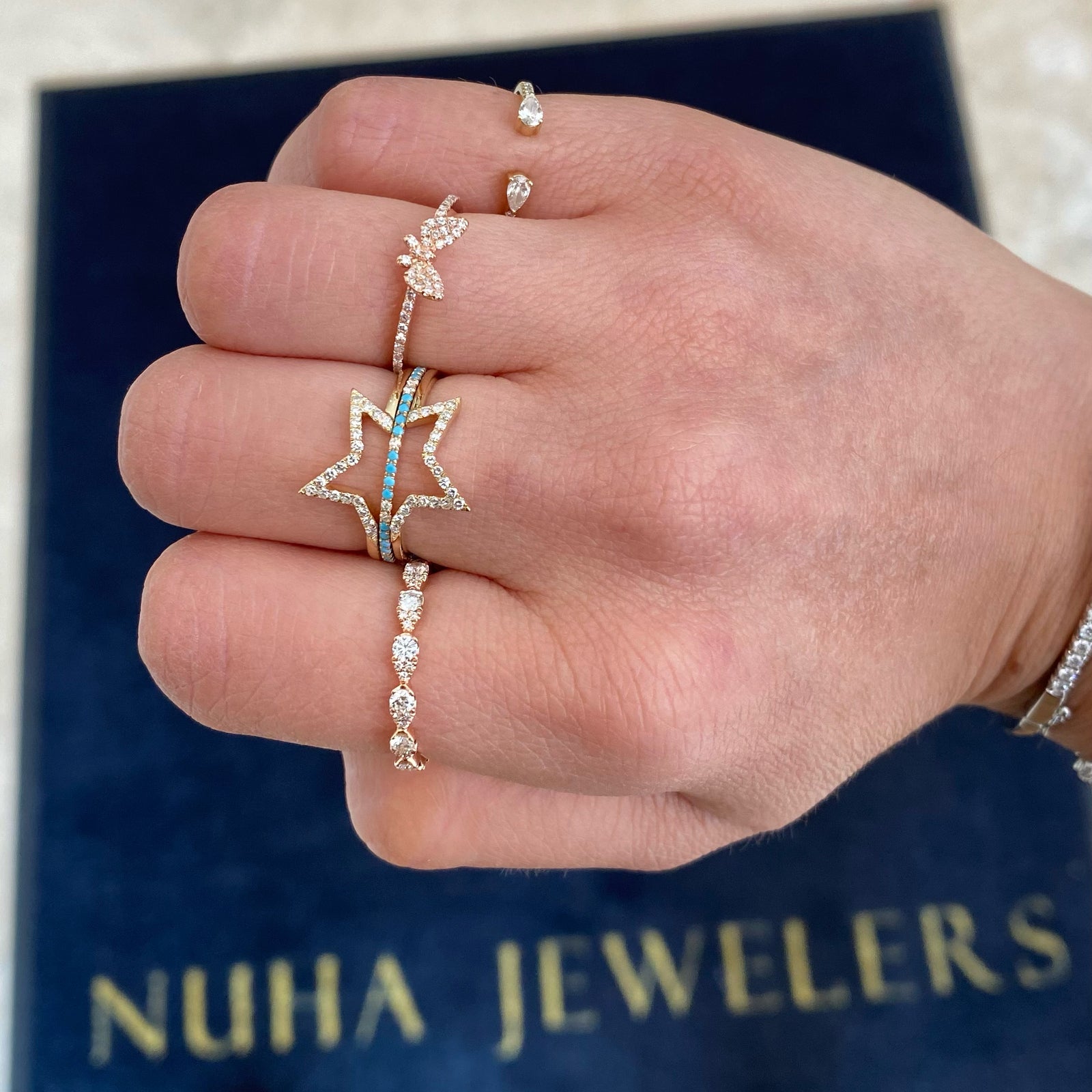 Diamond Petite Butterfly Ring  - 14K gold weighing 1.16 grams  - 50 round diamonds totaling 0.16 carats