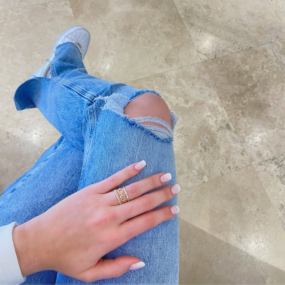 Female Model Wearing Baguette Diamond Stackable Ring - 14K gold weighing 0.95 grams  - 27 slim baguettes totaling 0.45 carats