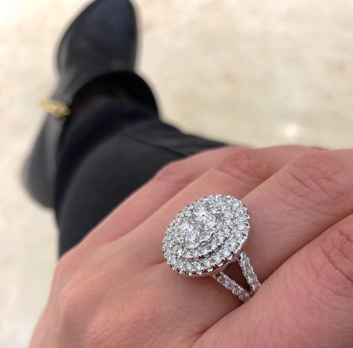 Circular Diamond Cluster Engagement Ring  -18k gold weighing 10.51 grams  -79 round diamonds weighing 2.36 carats