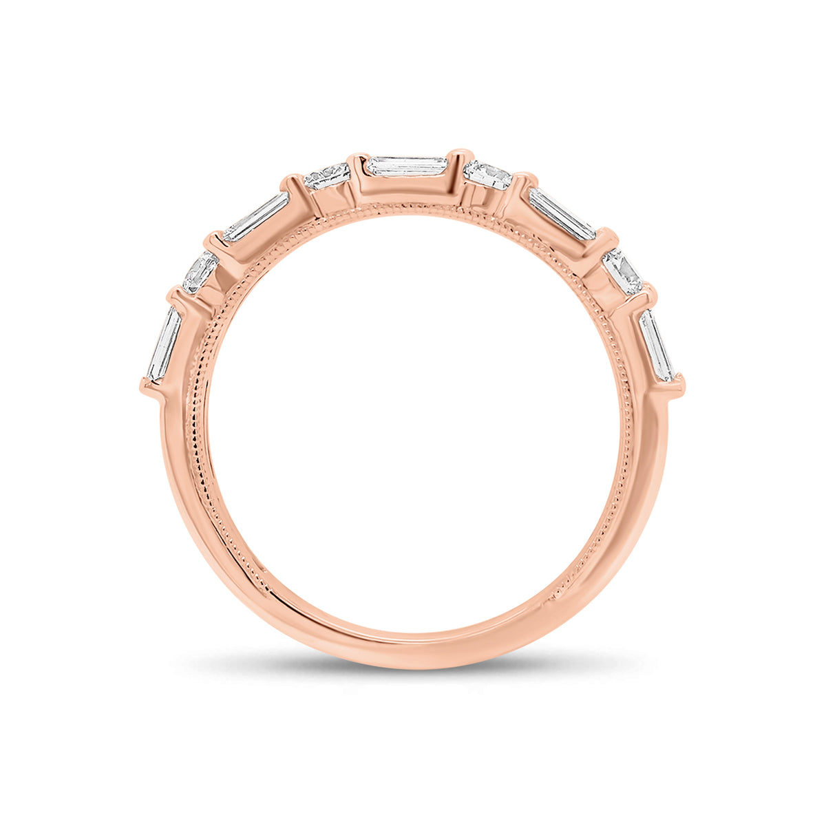 Round and Double Baguette Diamond Wedding Band - 18K gold weighing 2.78 grams  - 10 slim baguettes weighing 0.38 carats  - 4 round diamonds weighing 0.31 carats