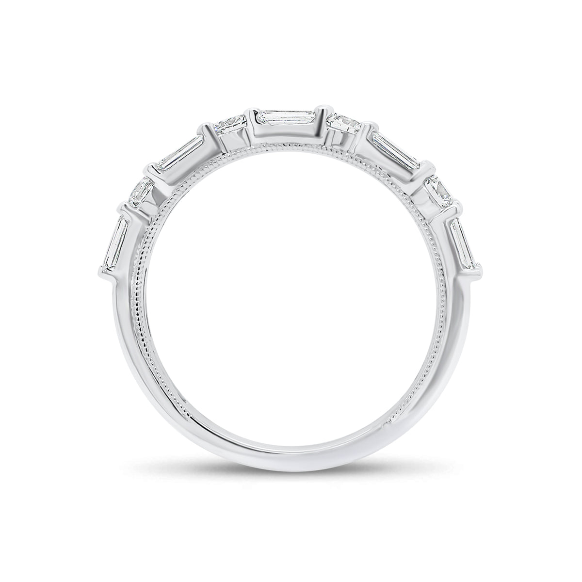 Round and Double Baguette Diamond Wedding Band - 18K gold weighing 2.78 grams  - 10 slim baguettes weighing 0.38 carats  - 4 round diamonds weighing 0.31 carats