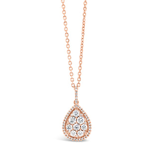 Diamond Cluster Teardrop Necklace  -18K weighing 1.63GR  -54 round diamonds totaling 0.38 carats  -3 round diamonds totaling 0.26 carats 