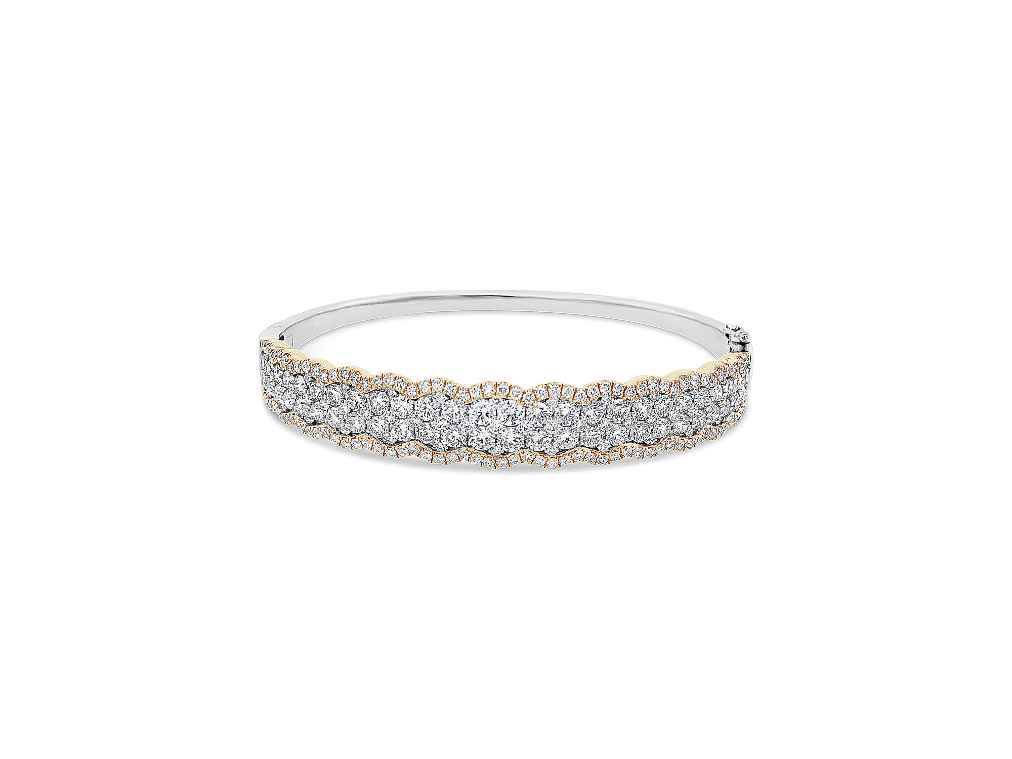 Diamond Two-Tone Bangle Bracelet -18K rose gold weighing 20.63 grams -52 round diamonds totaling 2.90 carats -157 pave diamonds totaling 1.33 carats