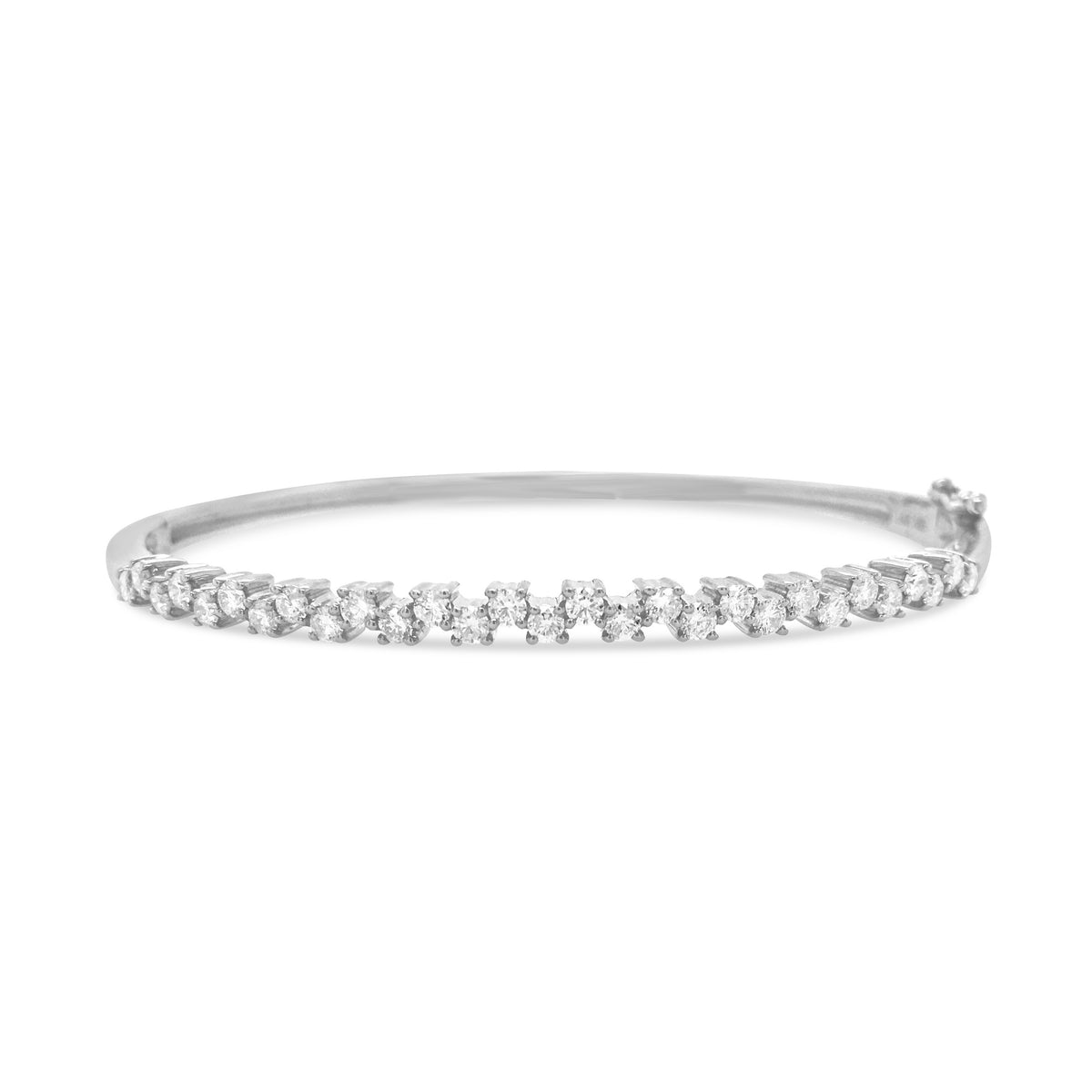 Diamond Zig-Zag Bangle Bracelet  -14K gold weighing 9.50 grams  -29 round diamonds totaling 1.00 carat