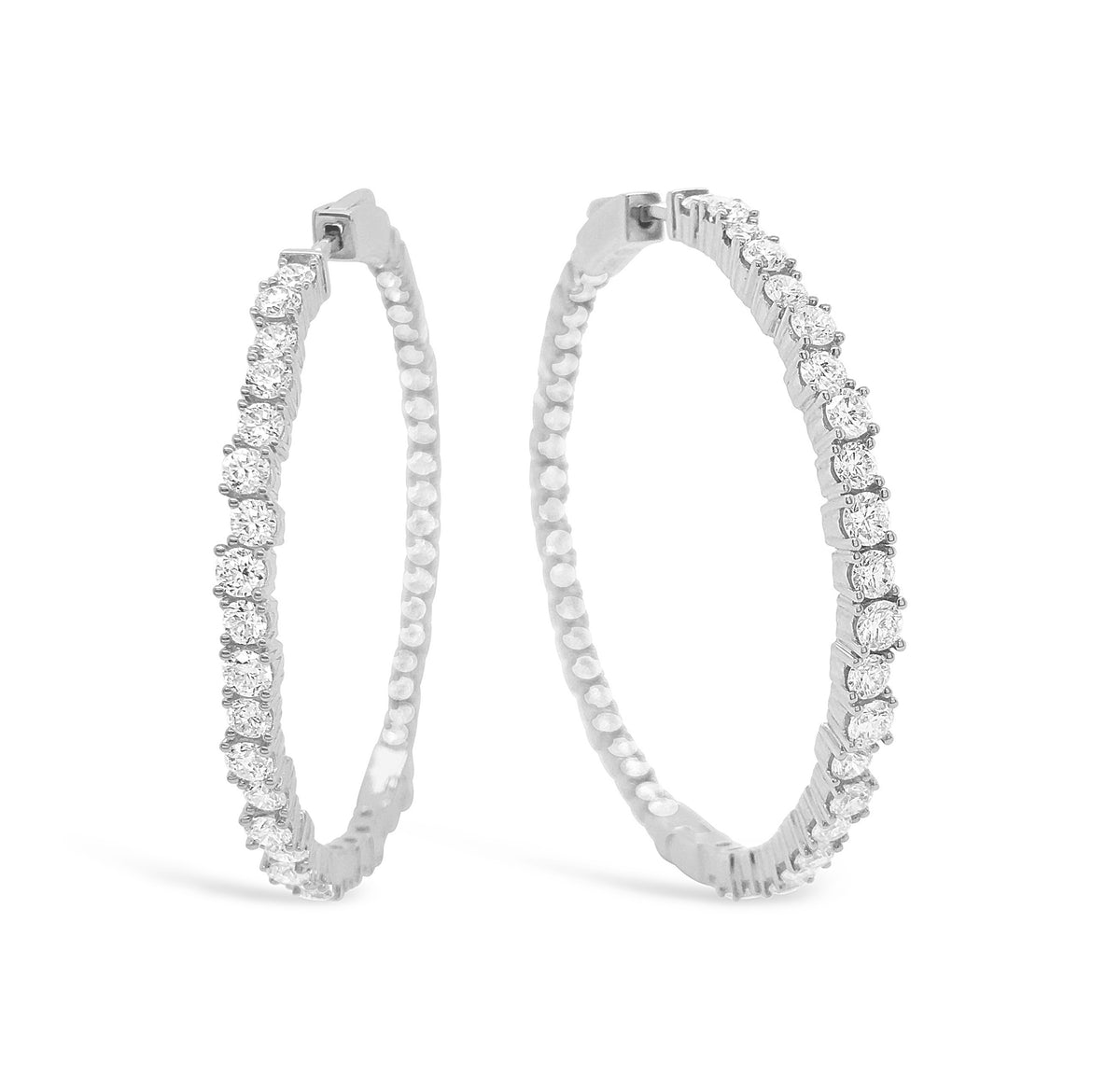 Large diamond scattered hoop earrings -14k gold weighing 13.65 grams -88 round prong-set diamonds weighing 4.35 carats