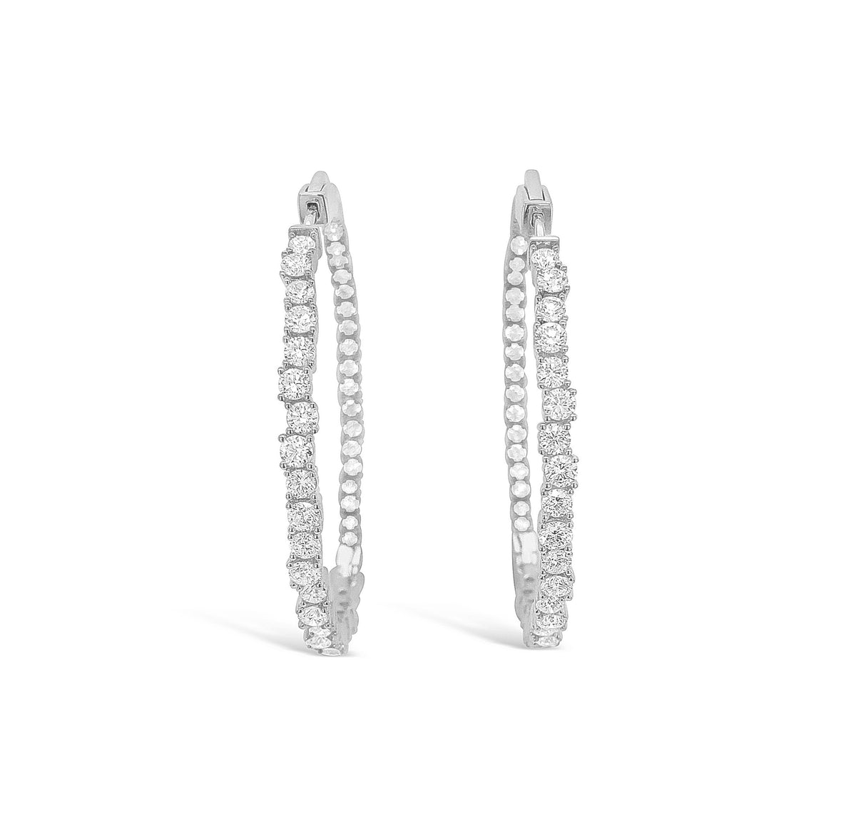 Large diamond scattered hoop earrings -14k gold weighing 13.65 grams -88 round prong-set diamonds weighing 4.35 carats