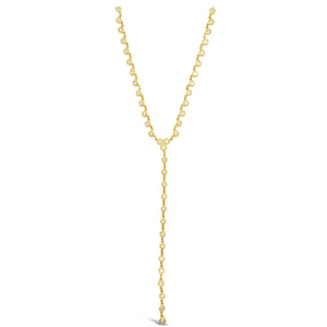 Bezel-Set Diamond Lariat Necklace  -14K gold weighing 5.69 grams  -43 round bezel-set diamonds weighing 0.52 carats