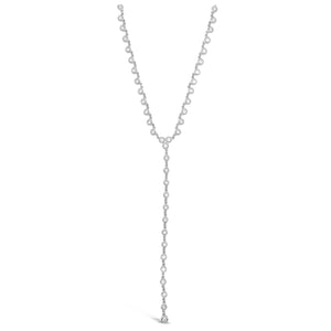 Bezel-Set Diamond Lariat Necklace  -14K gold weighing 5.69 grams  -43 round bezel-set diamonds weighing 0.52 carats